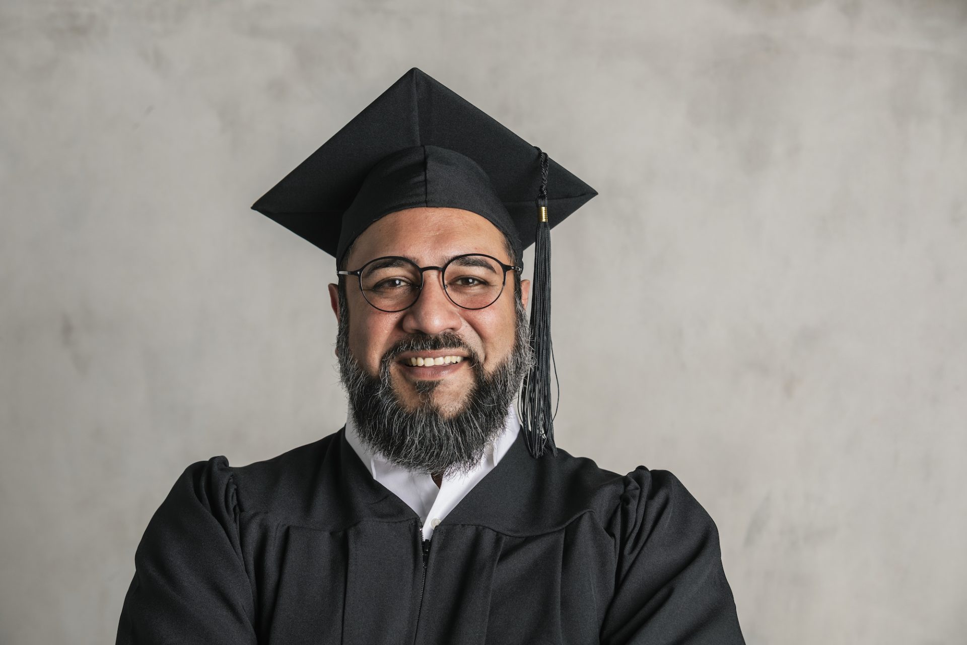 proud senior man in a graduation gown 2023 11 27 04 59 34 utc